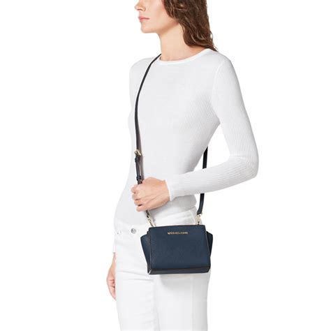 michael kors selma silver saffiano leather mini messenger navy blue|Michael Kors .